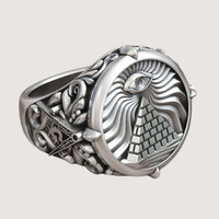The Masonic All-Seeing Eye Pyramid Illuminati Ring features a silver band engraved with a pyramid, All-Seeing Eye, wavy lines, intricate patterns, and mysterious symbols.