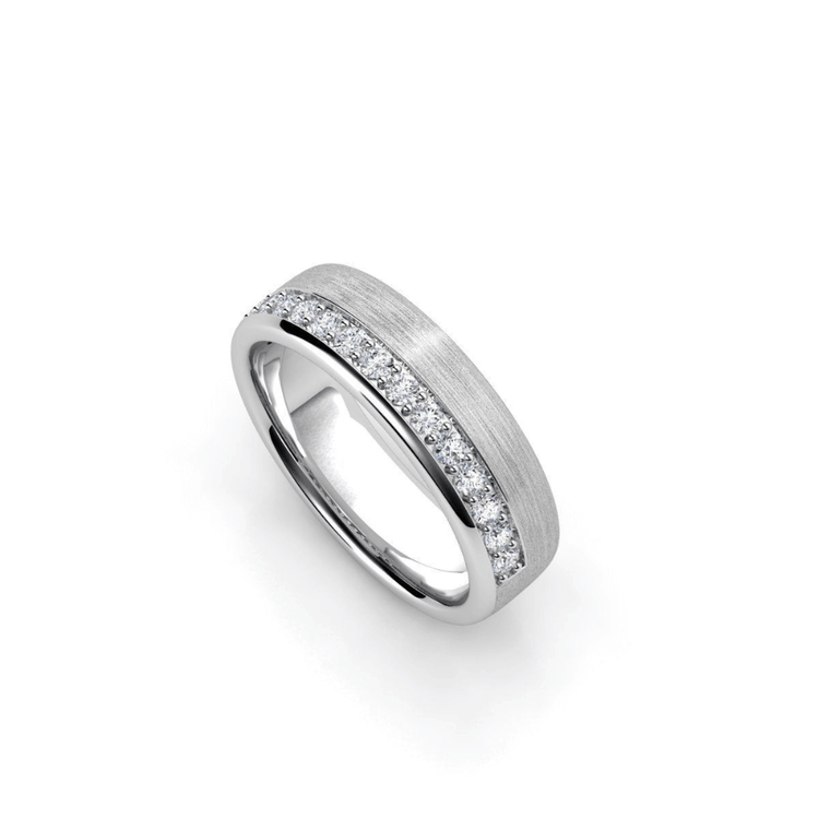 The Men's Wedding Band Brushed White Gold with Lab Diamond Inlay features a matte finish and a channel of lab diamonds along one side, shown on a white background.