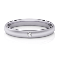 The Men's Wedding Band Center Stone Lab Grown Diamond - 3mm is a sleek silver band with a single small round lab diamond set into it, shown on a white background.