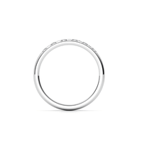 A minimalist Men's Wedding Band in white gold with lab grown diamonds, featuring a slim eternity band design and small, evenly spaced diamonds set along the top half, shown against a plain white background.