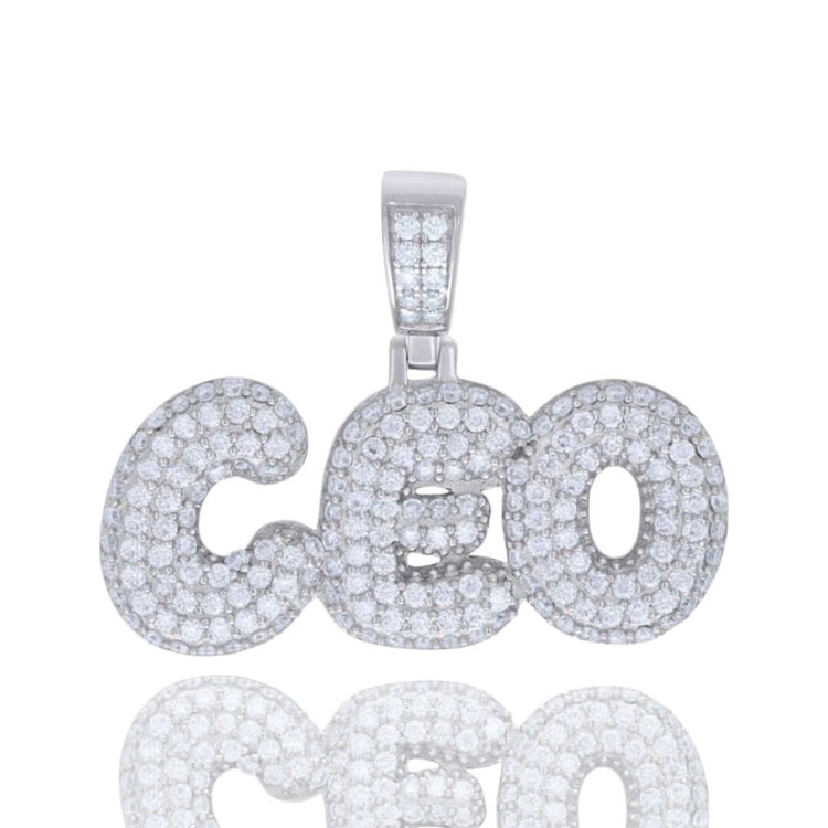 The Moissanite CEO Fashion Charm Pendant features the word "CEO" encrusted with sparkling VVS moissanite stones, set in your choice of sterling silver or white gold.