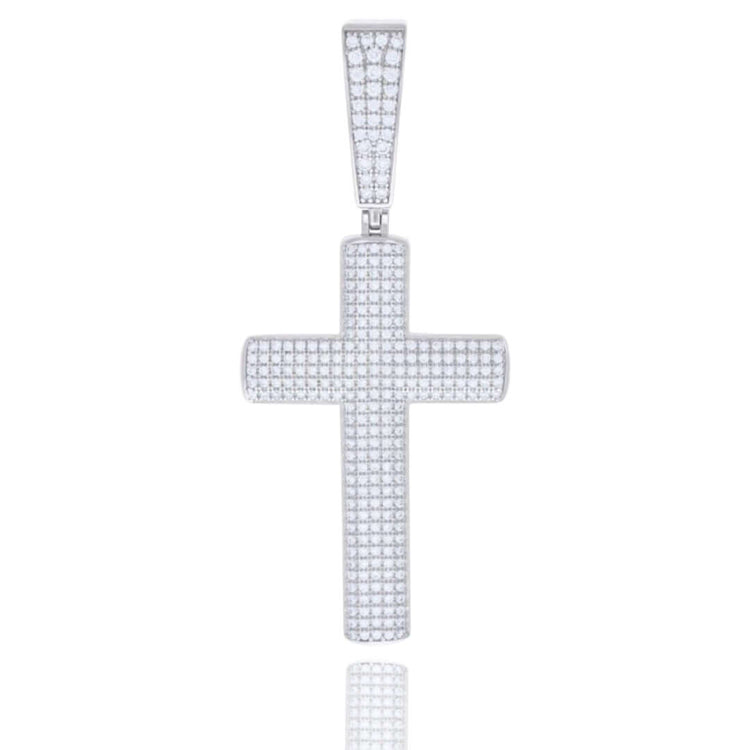 The Moissanite Cross Religious Charm Pendant features small, sparkling stones in a grid pattern and a rectangular bail for necklaces. This sterling silver charm is shown on a plain white background.