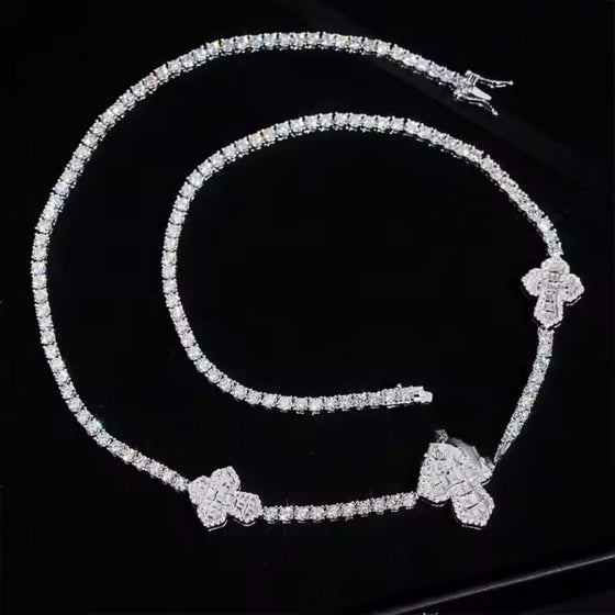 alt=" Shop the 3mm Moissanite Cross Tennis Chain. Iced out with brilliant moissanite stones, crafted in 925 silver. "