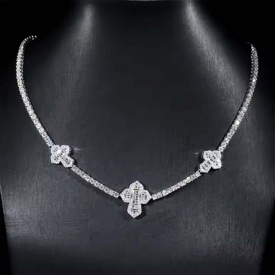 alt=" Shop the 3mm Moissanite Cross Tennis Chain. Iced out with brilliant moissanite stones, crafted in 925 silver. "