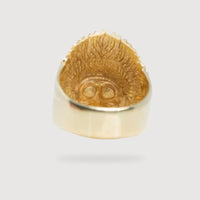 The Native Skull Men Ring – Solid 14K Gold features an engraved face in a feathered headdress, with the Native Skull design partially visible inside when viewed from the back.