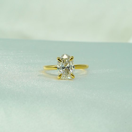 1.72ct Oval Cut Solitaire Engagement Ring in 14k Solid Yellow Gold, stamped for authenticity. IGI certified Lab Grown Diamond | GOLDZENN  