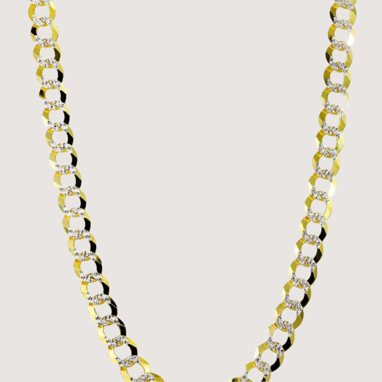 A close-up of the Pavé Curb Link Chain, a 2mm-5.5mm solid yellow gold necklace with large, flat interlocking links, shown against a plain white background.