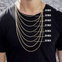 A person in a black shirt models seven Pavé Curb Link Chains (2mm-5.5mm Solid Yellow Gold) from 16" to 28", showcasing how each necklace sits at different lengths on the chest.