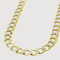 A close-up of the Pavé Curb Link Chain - 7mm - 13mm in solid yellow gold, featuring large interlocking links partially encrusted with diamonds, set against a plain white background.