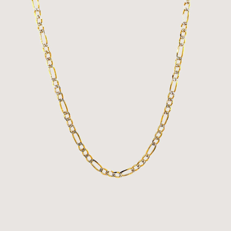 The Pave Figaro Chain 6.5mm in solid yellow gold features elongated oval links and a simple, elegant design, displayed against a plain light background.