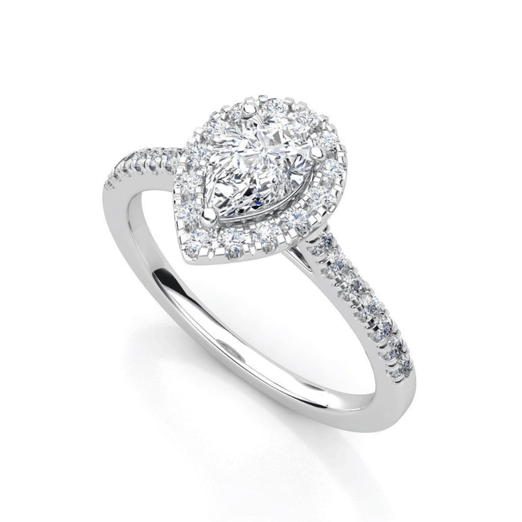 The Pear-Shaped Halo Lab Diamond Engagement Ring with Pavé Band features a pear-shaped lab diamond center, a halo of smaller diamonds, and extra pavé accents on a slim, polished white metal band.