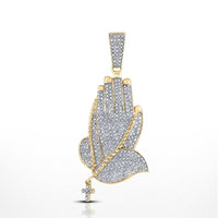 The Diamond Prayer Hands Pendant 7/8CT 10K Gold features two hands in prayer adorned with diamonds, a rosary draped over them, and a small cross hanging at the end—a stunning 10K gold diamond charm.