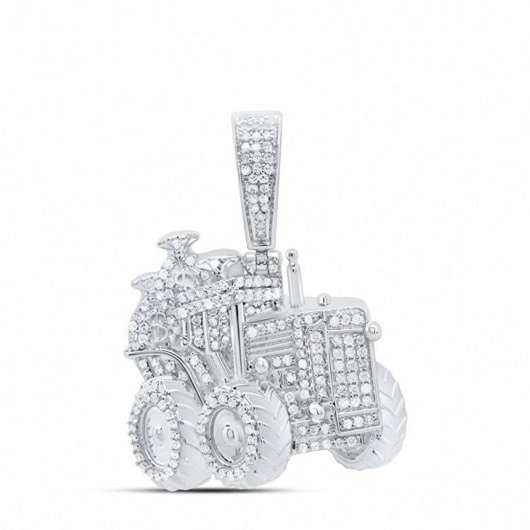 The Sterling Silver Diamond Truck Charm 5/8CTW features a tractor-shaped design adorned with sparkling diamonds, set against a plain white background—an eye-catching addition to natural diamond men’s jewelry.