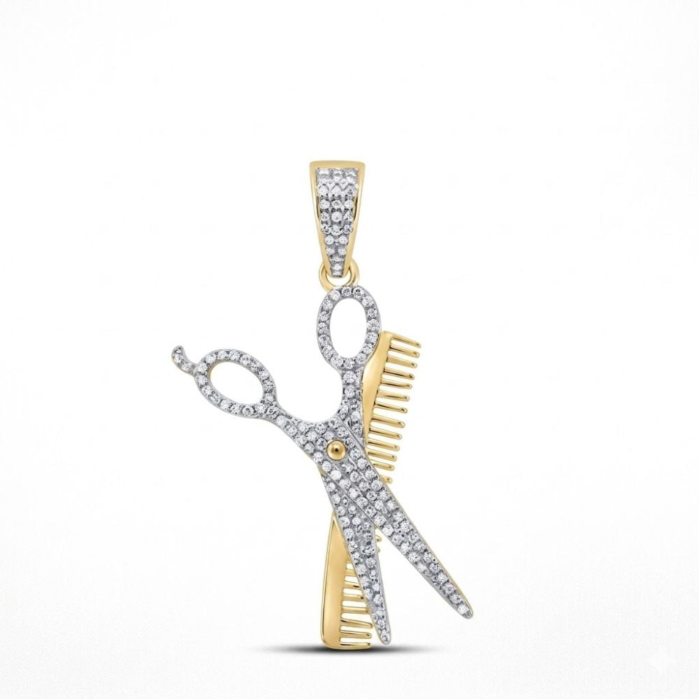 The 10K Gold Diamond Barber Scissors Comb Charm 0.75 CTW features a gold and silver pendant shaped like crossed scissors and comb, both set with sparkling diamonds, making a stylish statement against a plain white background.