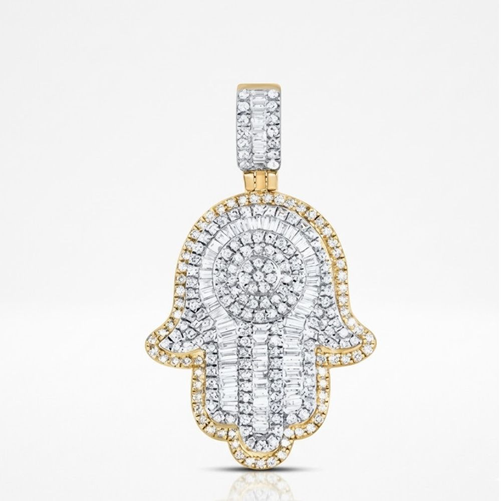 The Diamond Hamsa Pendant 1CT in 10K yellow gold features rows of sparkling diamonds in a palm-shaped design with a central circular pattern, displayed against a plain white background.