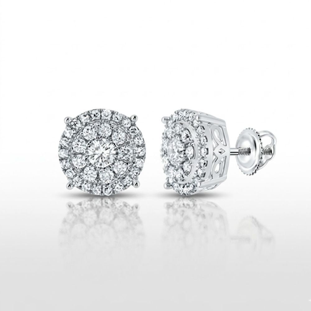 The 14K Gold Round Diamond Cluster Earrings (5/8 Cttw) feature round diamonds in clusters with halos and screw-back clasps, all set in white metal and displayed on a glossy white background.
