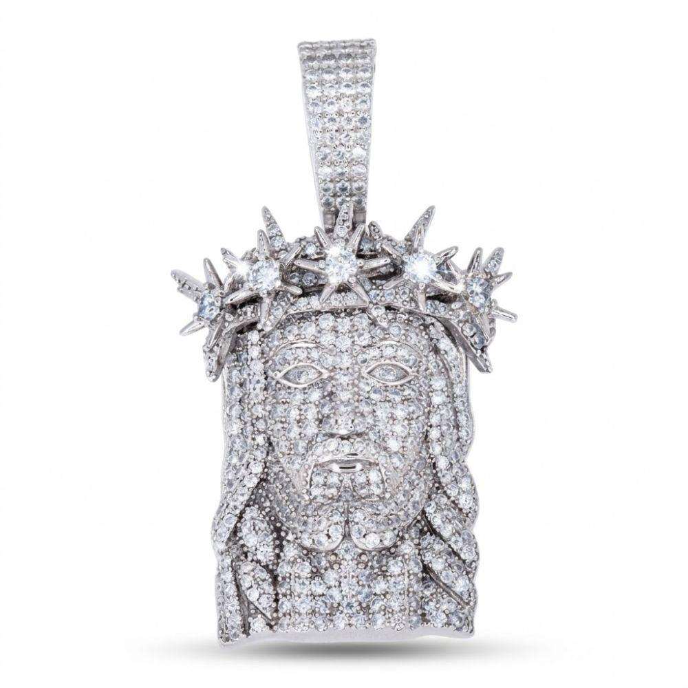 The 925 Silver Men Moissanite Jesus Pendant features a detailed face with a beard, long hair, and spiked crown, all sparkling with moissanite stones—creating a striking religious statement against a plain white background.