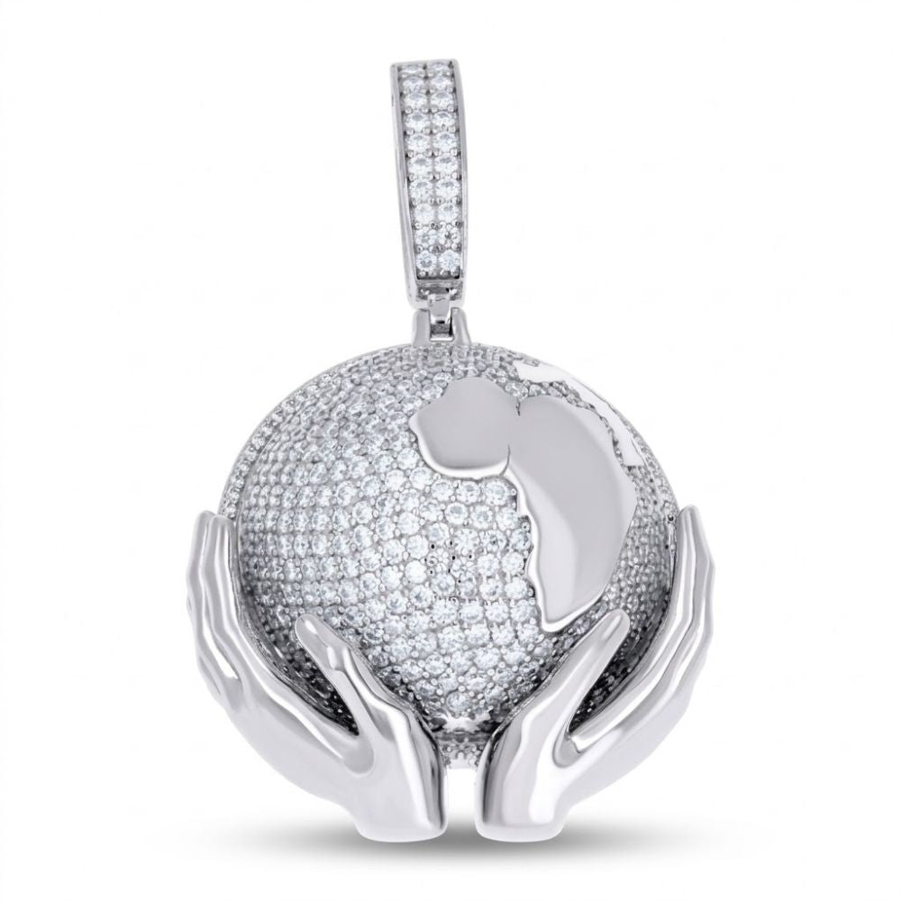 The Sterling Silver Moissanite World Map Pendant showcases two hands cradling a sparkling globe with diamond-like stones, a polished Africa map, and hangs from a gem-encrusted bail.