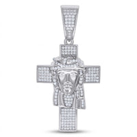 The Sterling Silver Moissanite Jesus Cross Pendant features 925 silver and sparkling stones, showcasing a detailed Jesus face with a crown of thorns—a bold religious charm for men.