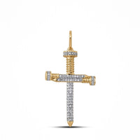 The 10K Gold Diamond Nail Cross Charm Pendant 1/3 CTW, shaped like two nails and encrusted with white diamonds, is displayed against a plain white background—a striking piece for hip hop jewelry lovers.
