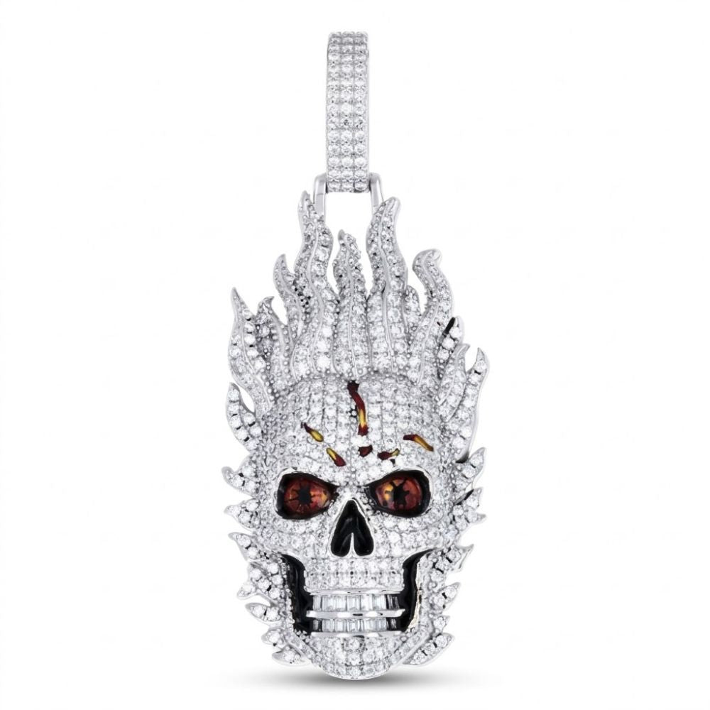 The Sterling Silver Moissanite Fire Skull Pendant for Men showcases flame-inspired details, moissanite charm eyes, gold forehead accents, and a matching diamond-encrusted bail—an eye-catching jewelry piece.
