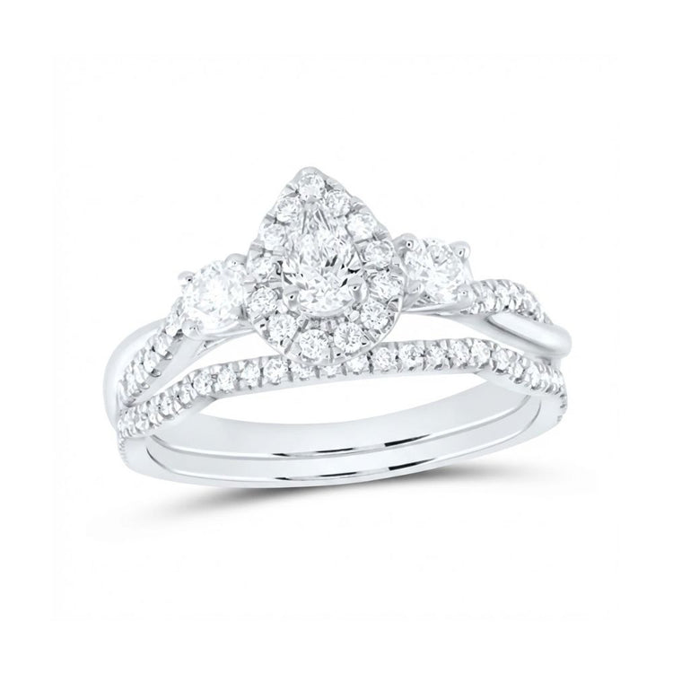 The 14k White Gold Pear Diamond Halo Wedding Ring Set features a pear-shaped diamond halo engagement ring with a split pavé shank, two round side diamonds, and a matching diamond wedding band.