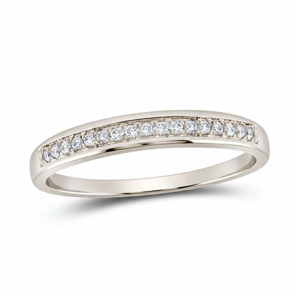 The 10k White Gold Diamond Wedding Band Ring 1/10 Cttw features a row of round diamonds set along the top, shown on a plain white background.
