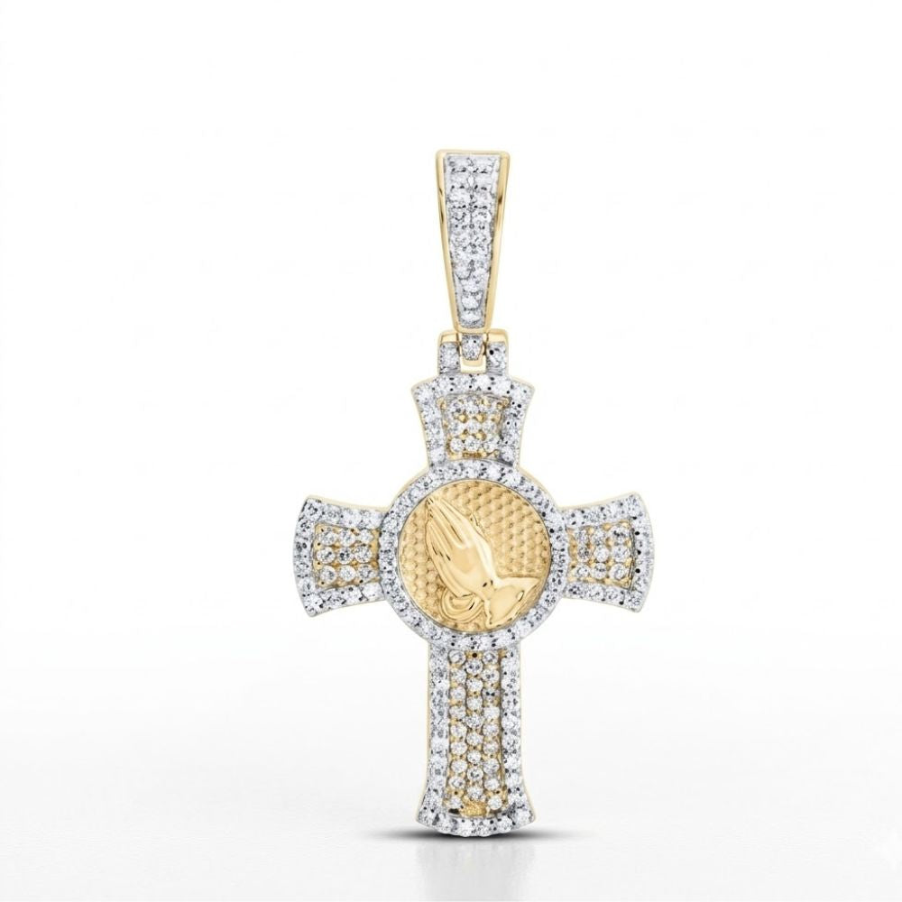 The Diamond Praying Hand Cross Charm 5/8CT 10K Gold features a raised gold praying hands motif with diamond accents, crafted in yellow gold and silver. This men’s pendant is shown on a clean white background.