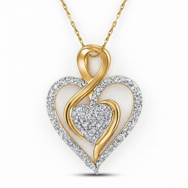 The 10K Yellow Gold Diamond Heart Pendant 1/4 CTW showcases an open gold heart encrusted with diamonds and a smaller diamond heart at the center for a stunning, romantic look.