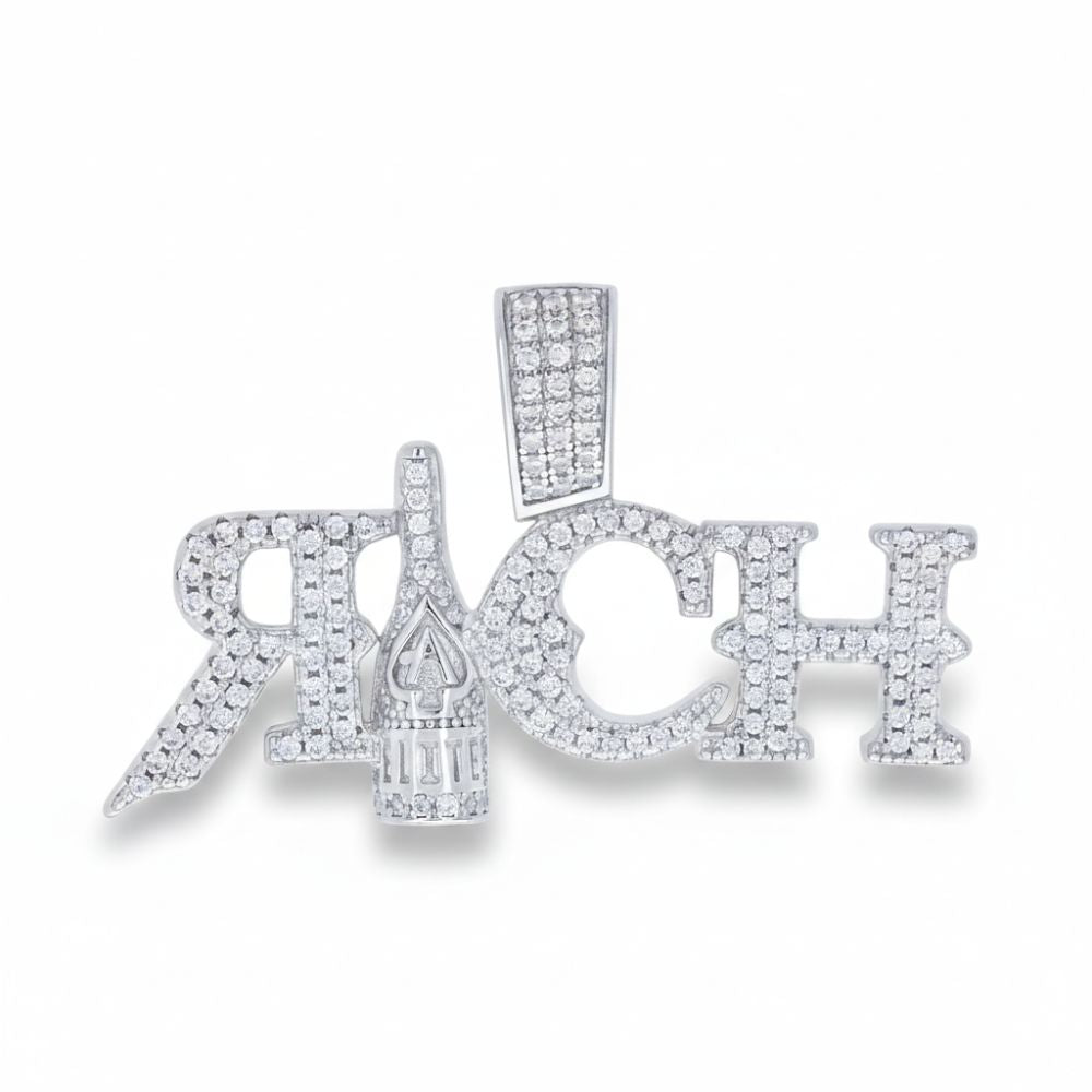 The Moissanite RICH Fashion Charm Pendant features “RICH” in capitals with a bottle-shaped design and an ace of spades in the “I”—a bold, luxe statement for jewelry lovers.