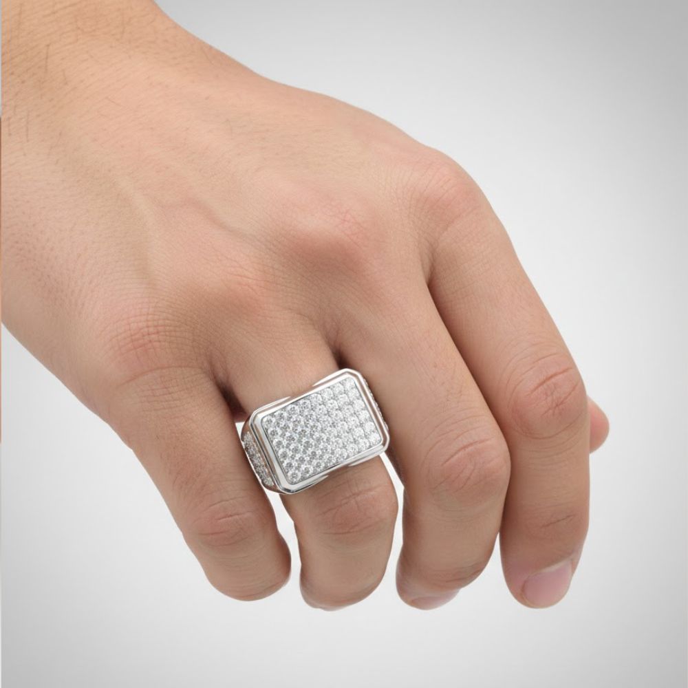 A hand displays the Square Statement 2-7/8ctw Diamond Cluster Ring in 10k white gold, featuring a bold cluster of sparkling diamonds, set against a simple light background.