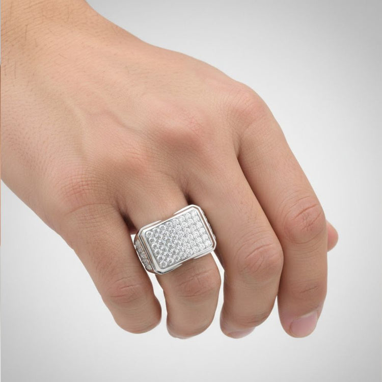 A hand displays the Square Statement 2-7/8ctw Diamond Cluster Ring in 10k white gold, featuring a bold cluster of sparkling diamonds, set against a simple light background.