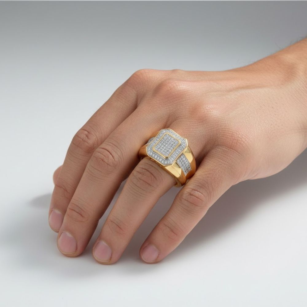 A hand showcases the 10k Yellow Gold Diamond Cluster Ring 1/3 Cttw, featuring multiple rows of sparkling diamonds set on the top and along the band, against a plain light background.