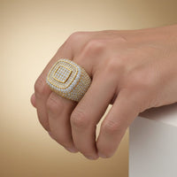 A hand showcases the Layered Square Diamond Ring – 6.23 CT Gold Design, a bold men’s ring featuring multiple rows of lab-grown diamonds, against a neutral gradient background.