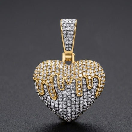 The 10k Yellow Gold Diamond Heart Pendant 0.75ct features a melting heart design with sparkling diamonds, resembling gold liquid dripping down the top, beautifully displayed against a black background.
