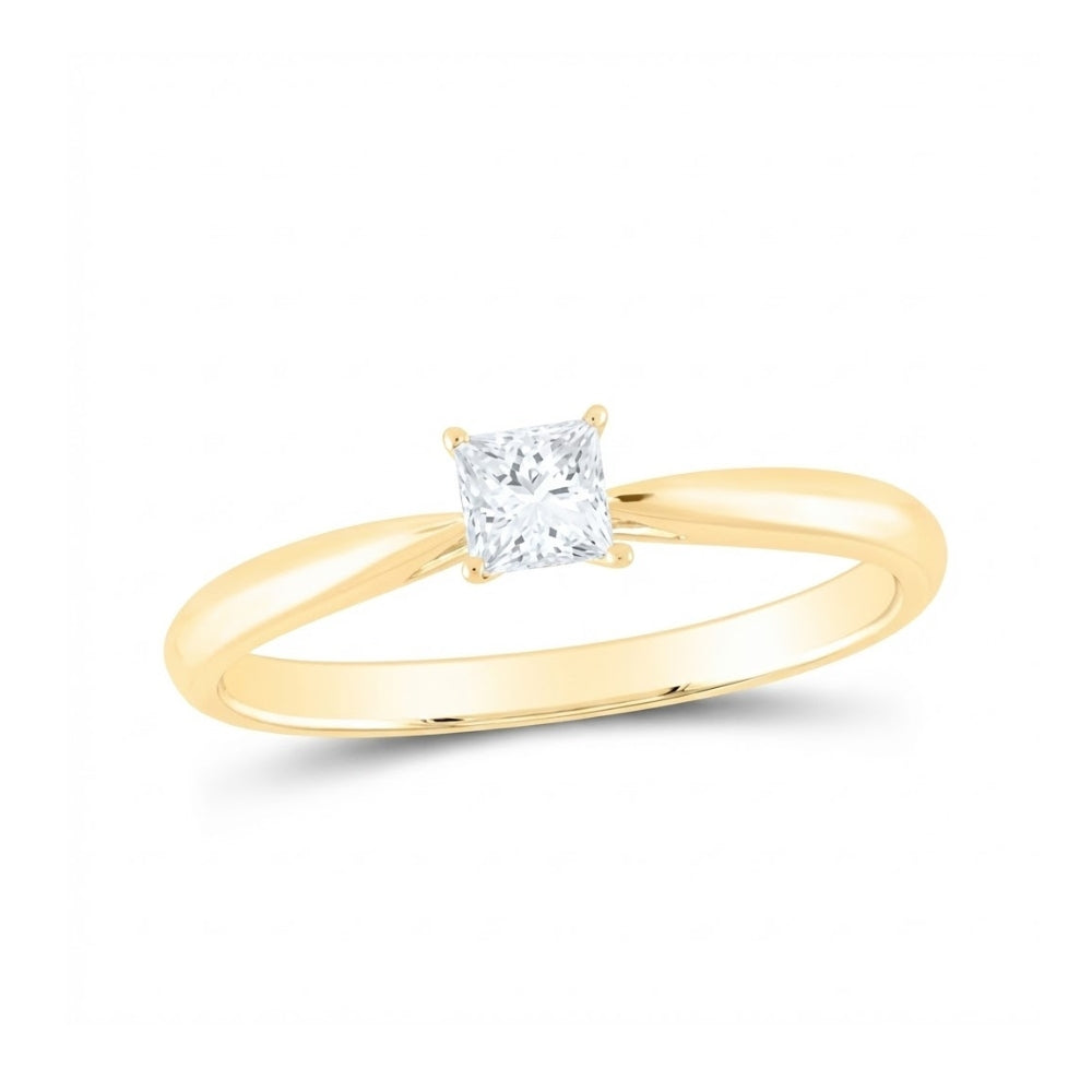 The 1/4CT Princess Diamond Solitaire Ring in 14K Gold features a single square-cut diamond in a classic four-prong setting on a polished band—a timeless choice.