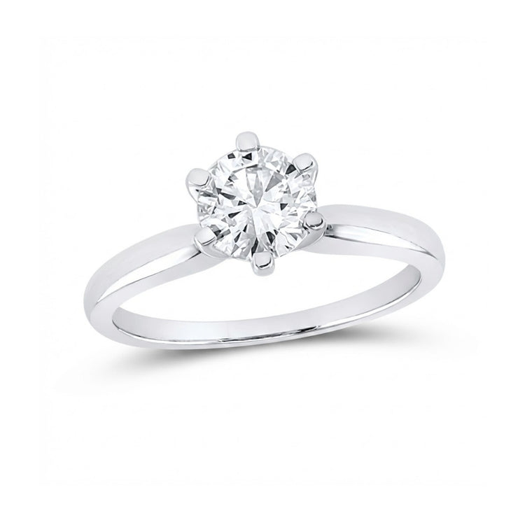 The 14k White Gold Round Diamond Solitaire Bridal Ring showcases a single round-cut diamond in a six-prong setting on a plain, polished 14k white gold band.