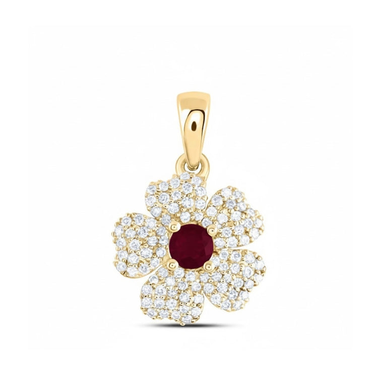 The 1/4CTW Diamond Flower Pendant in 14K Yellow Gold showcases five diamond-studded petals and a central red gemstone, creating an elegant floral design against a plain white background.
