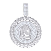 The 925 Silver Moissanite Praying Hands Symbol Charm features a round design with a twisted border, sparkling gemstones, and raised praying hands at the center, making it a meaningful spiritual jewelry piece.