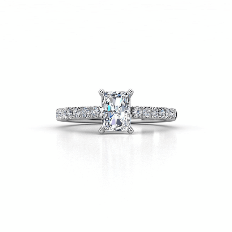 The Radiant-Cut Lab Grown Pavé Engagement Ring sparkles against a white background.