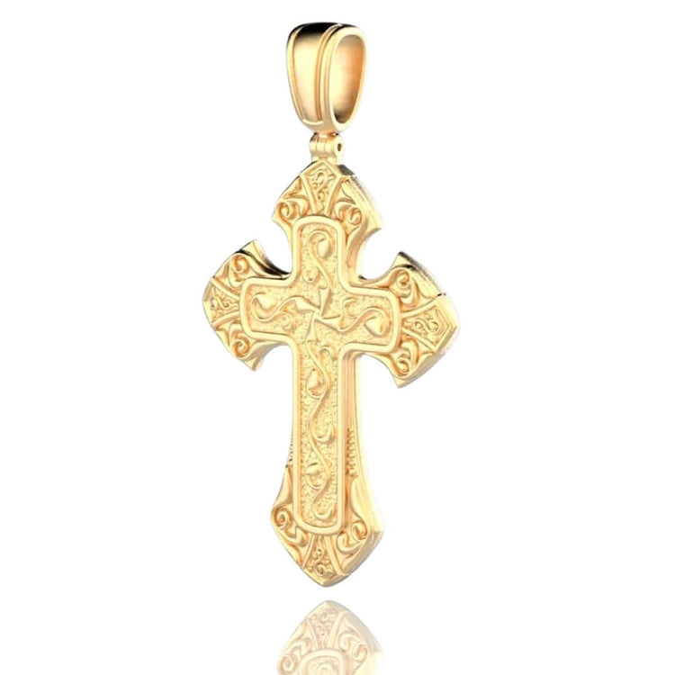 The Regal Patterned Gold Cross Pendant features intricate engravings and a polished 24K gold finish, set against a white background with a subtle reflection, symbolizing divine protection.