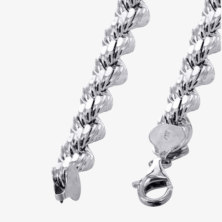 Close-up of the Rope Bracelet - 3mm-5mm Solid White Gold with a lobster clasp, shown on a white background. Thick, tightly woven links showcase the bold shine and luxury of 14K white gold craftsmanship.