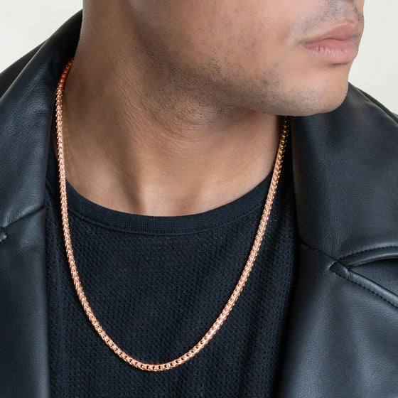 Image of model wearing 4mm Solid Rose Gold Diamond Cut Franco Chain 