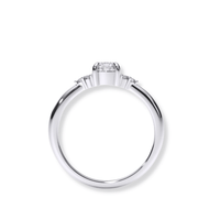 A close-up of the Round Brilliant Cut Diamond Engagement Ring, featuring a sparkling diamond set in polished gold.
