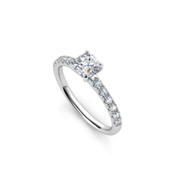 A beautiful Round-Cut Solitaire Lab Diamond Engagement Ring in white gold or platinum, featuring a brilliant lab diamond center stone, perfect as a women’s engagement ring and showcased on a white background.