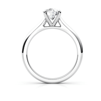 A Classic Round Solitaire Lab Grown Diamond Engagement Ring in white gold or platinum, featuring an elegant prong setting, displayed on a white background.