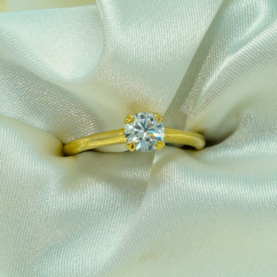 alt=" Explore the 0.73ct Round Lab Diamond Solitaire Engagement Ring. A stunning women’s engagement ring crafted in 14K gold with an eco-friendly lab-grown diamond. "