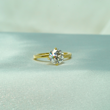  Round Solitaire Engagement Ring, featuring a 2.09ct certified lab grown diamond and set in a classic 4-prong setting in 14k solid yellow gold 