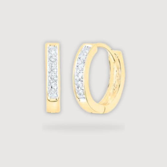 1/8CTW Round Diamond Hoop Channel Earrings - 10K Yellow GoldEnhance your style with these gold hoop earrings featuring a shimmering 1/8CTW of round diamonds in a channel setting. Perfect for any occasion.