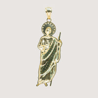 The Saint Jude Pendant in 14K Yellow Gold features a saintly figure with a halo, staff, and robe embellished with green CZ stones—an elegant men's accessory set against a plain light background.